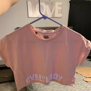 Gymshark crop tee size small. Never worn.